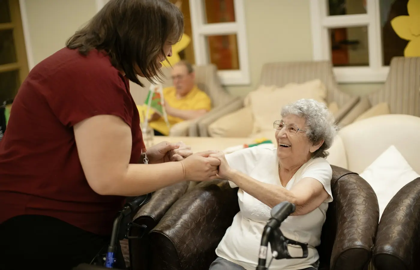 Caregiver inspecting a toy pull cord